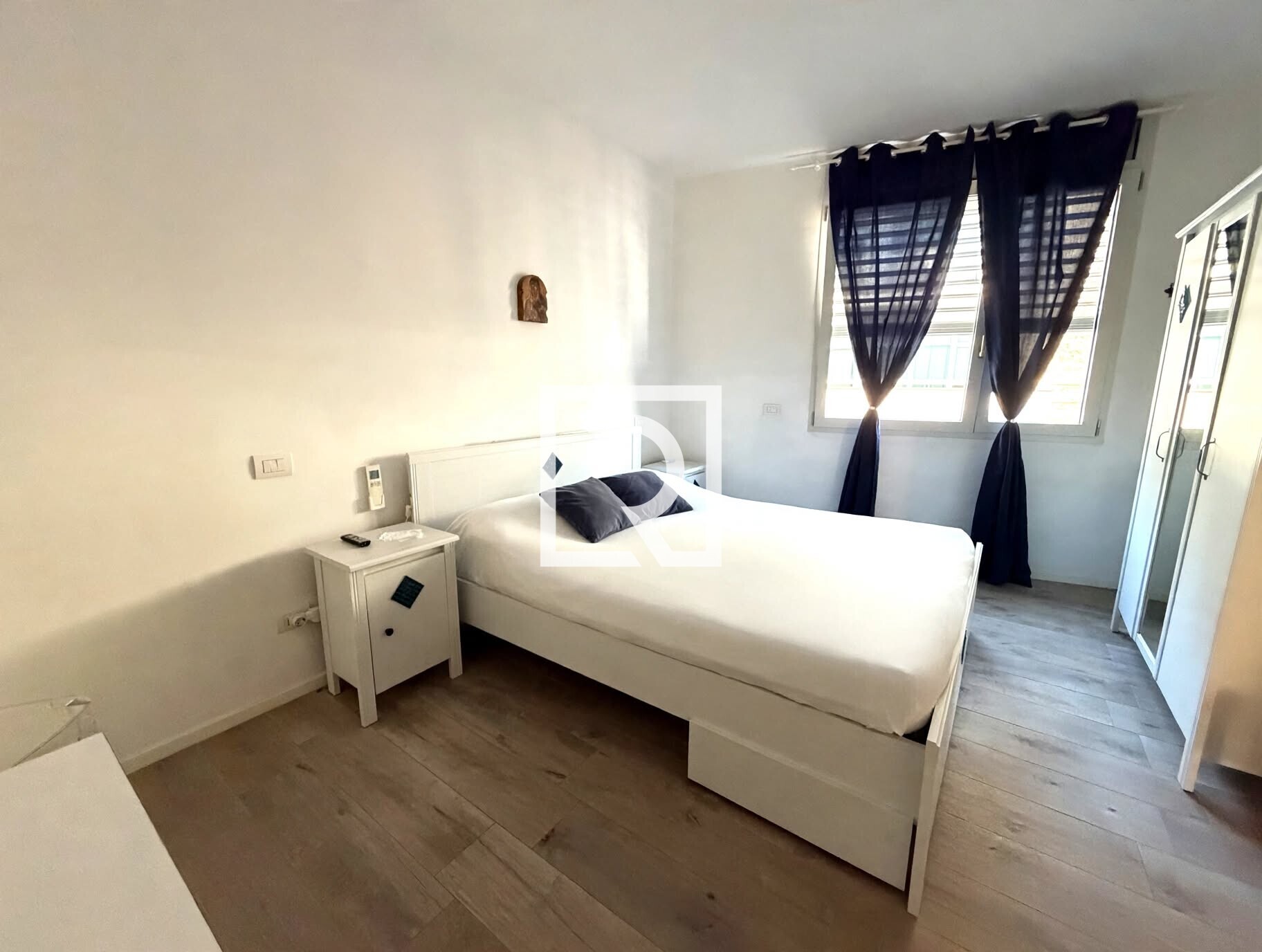 neatly_made_bedroom