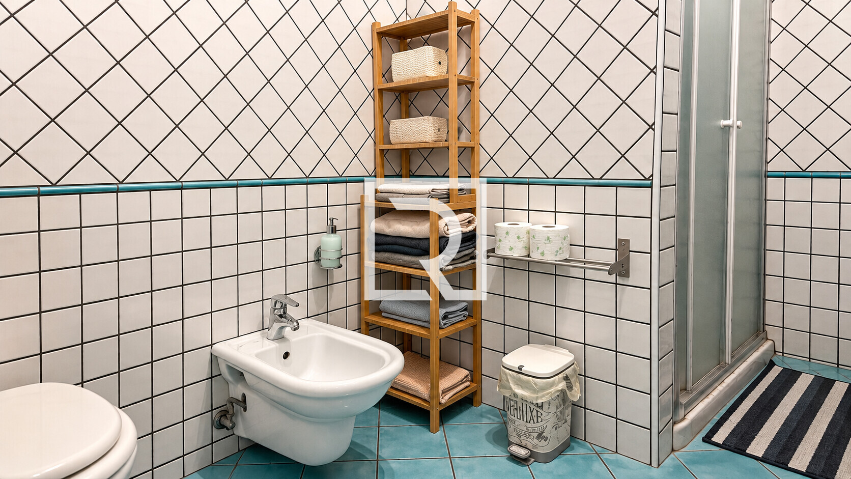 Tidy Teal-Tiled Bathroom Corner