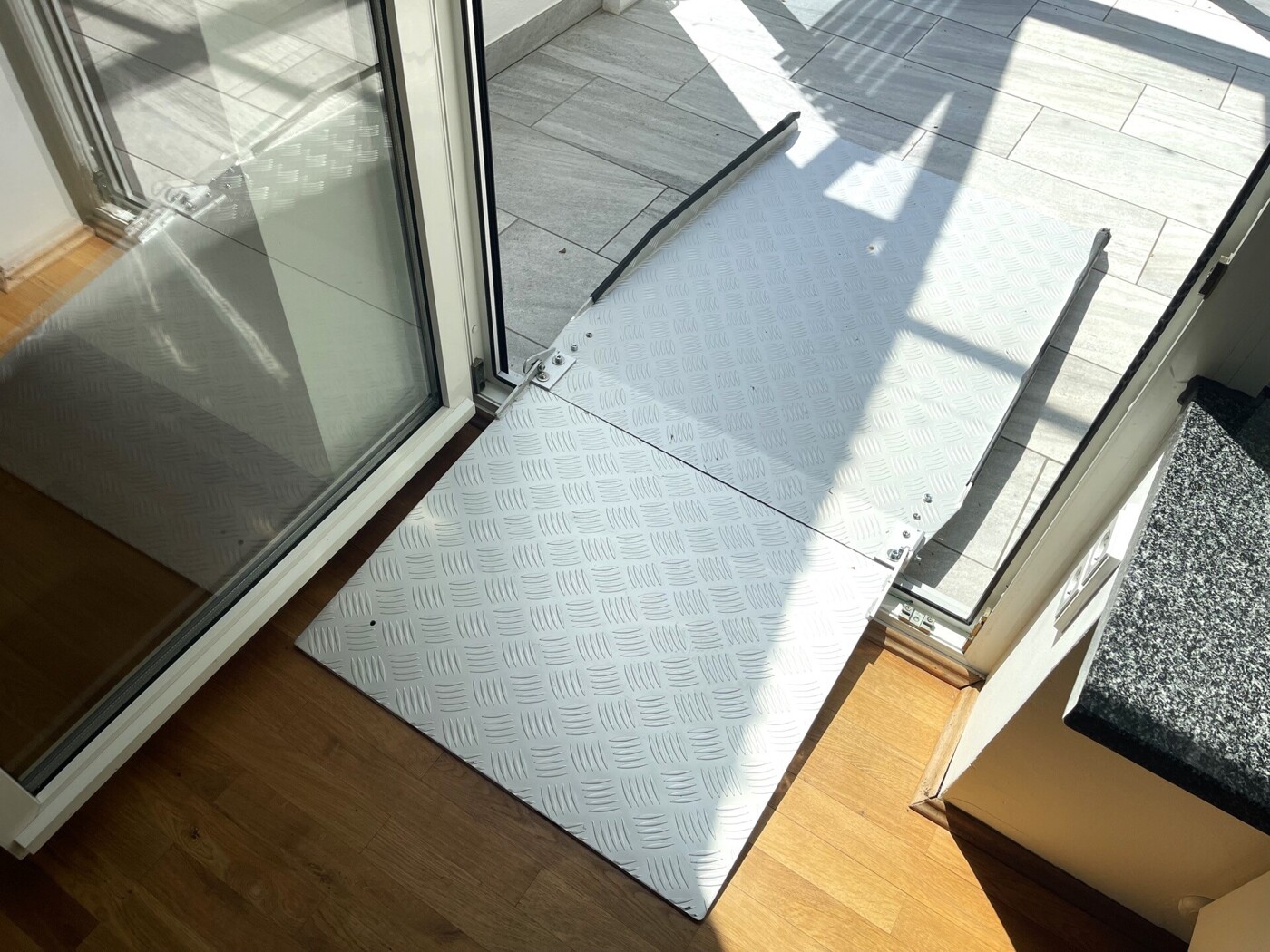 Rampe vom Wohnzimmer in den Wintergarten