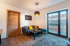 Wohnbereich mit Balkonzugang