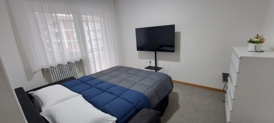 soggiorno con divano letto aperto