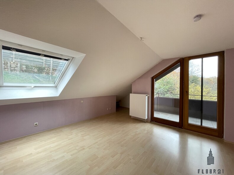 Schlafzimmer mit Balkonzugang