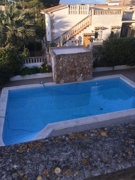 Piscina con cascada