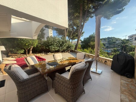 Bungalow-Apartment mit Südterrasse in 1. Meereslinie in Cala Vinyes, Mallorca – zu verkaufen