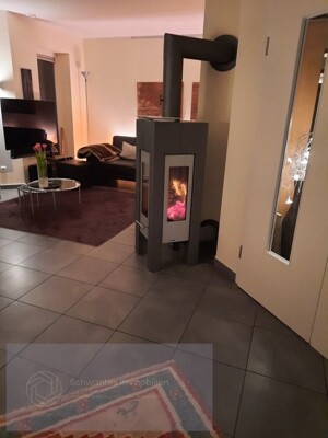 Wohnzimmer mit Kamin