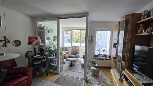 Wohnzimmer mit Wintergarten