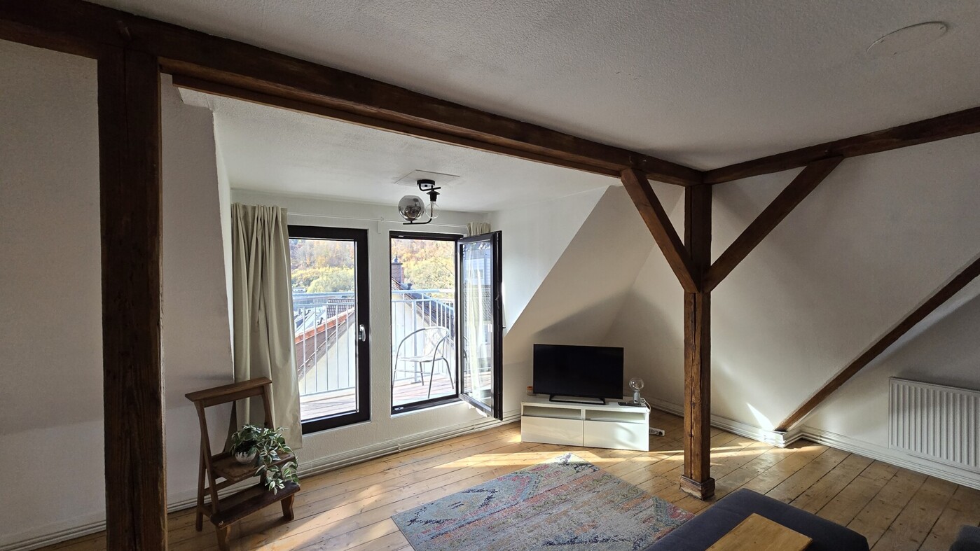 Wohnzimmer mit Zugang zum Freisitz