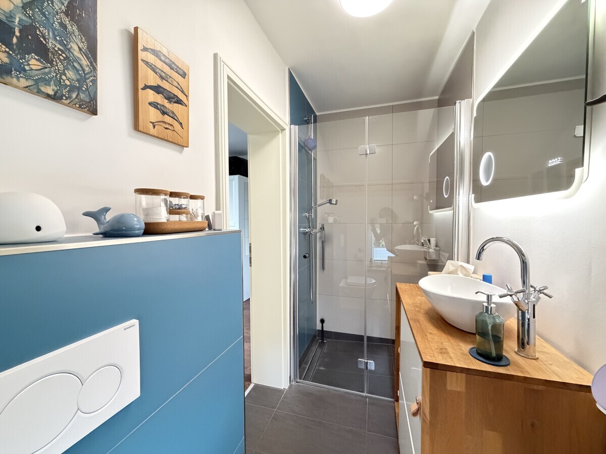 ... mit Duschbad en Suite