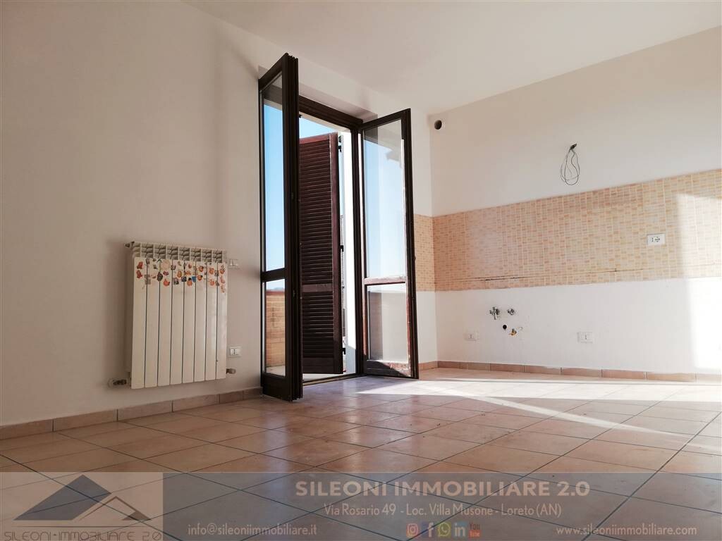 TRILOCALE IN PALAZZINA DEL 2007 CON TERRAZZO