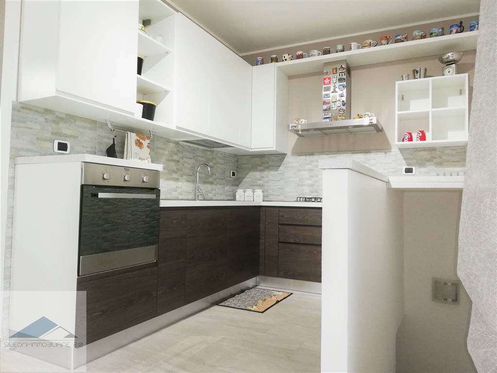 APPARTAMENTO PARI AL NUOVO CON GIARDINO E GARAGE — foto 4