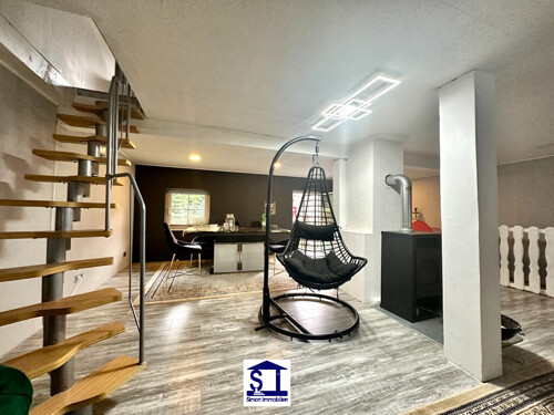 Wohnzimmer mit Kaminofen