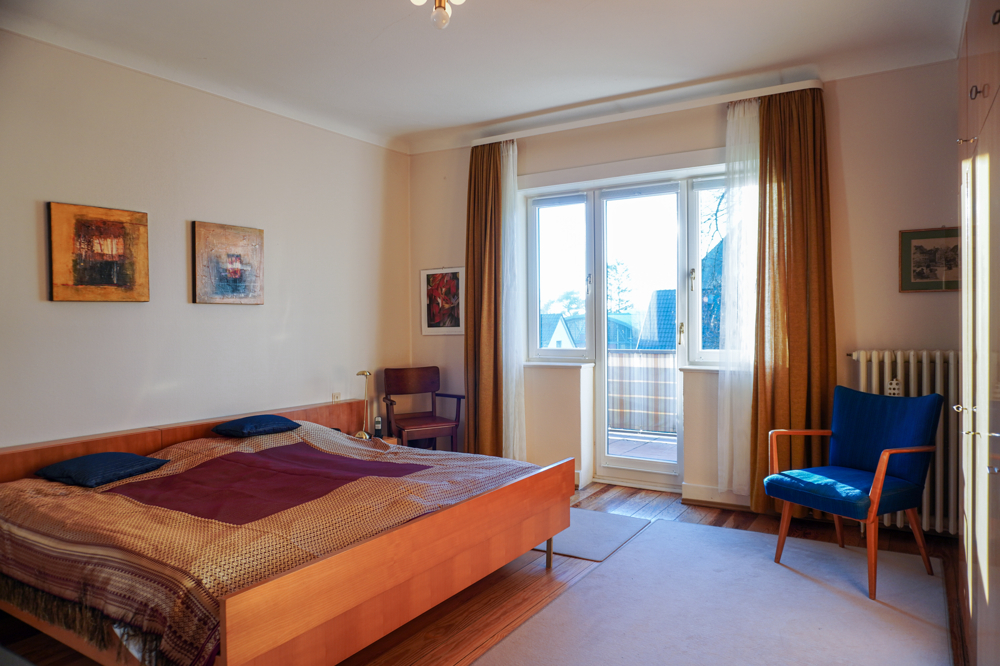 Schlafzimmer mit Balkon