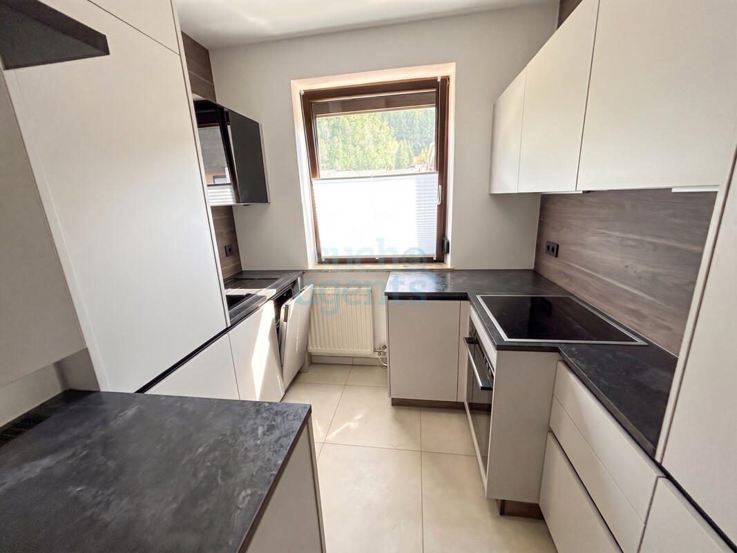 Neuer Preis! Sanierte 2-Zimmer-Wohnung mit Südbalkon, Tiefgarage und großem Keller