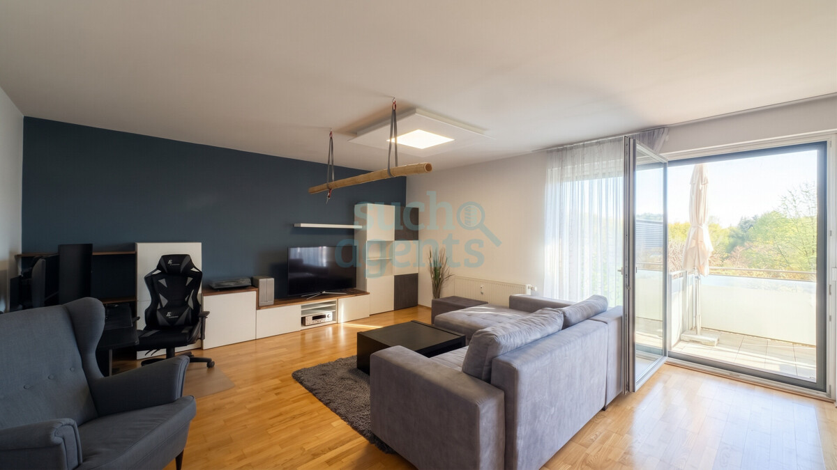 Solar City - Moderne Wohnung mit Süd-Loggia, Garage und unverbaubarem Grünblick