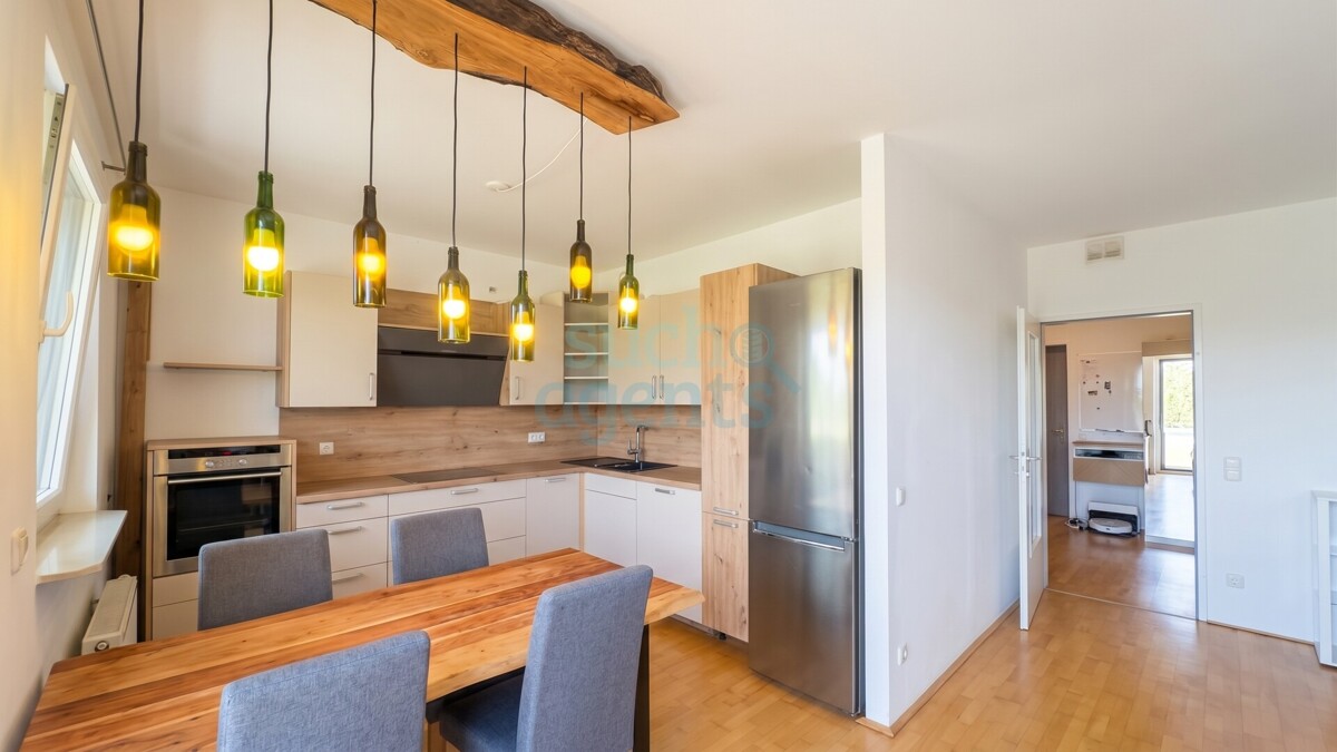 Solar City - Moderne Wohnung mit Süd-Loggia, Garage und unverbaubarem Grünblick