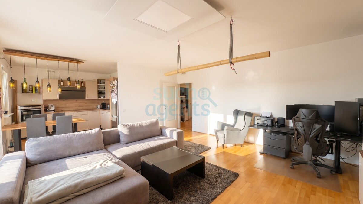 Solar City - Moderne Wohnung mit Süd-Loggia, Garage und unverbaubarem Grünblick