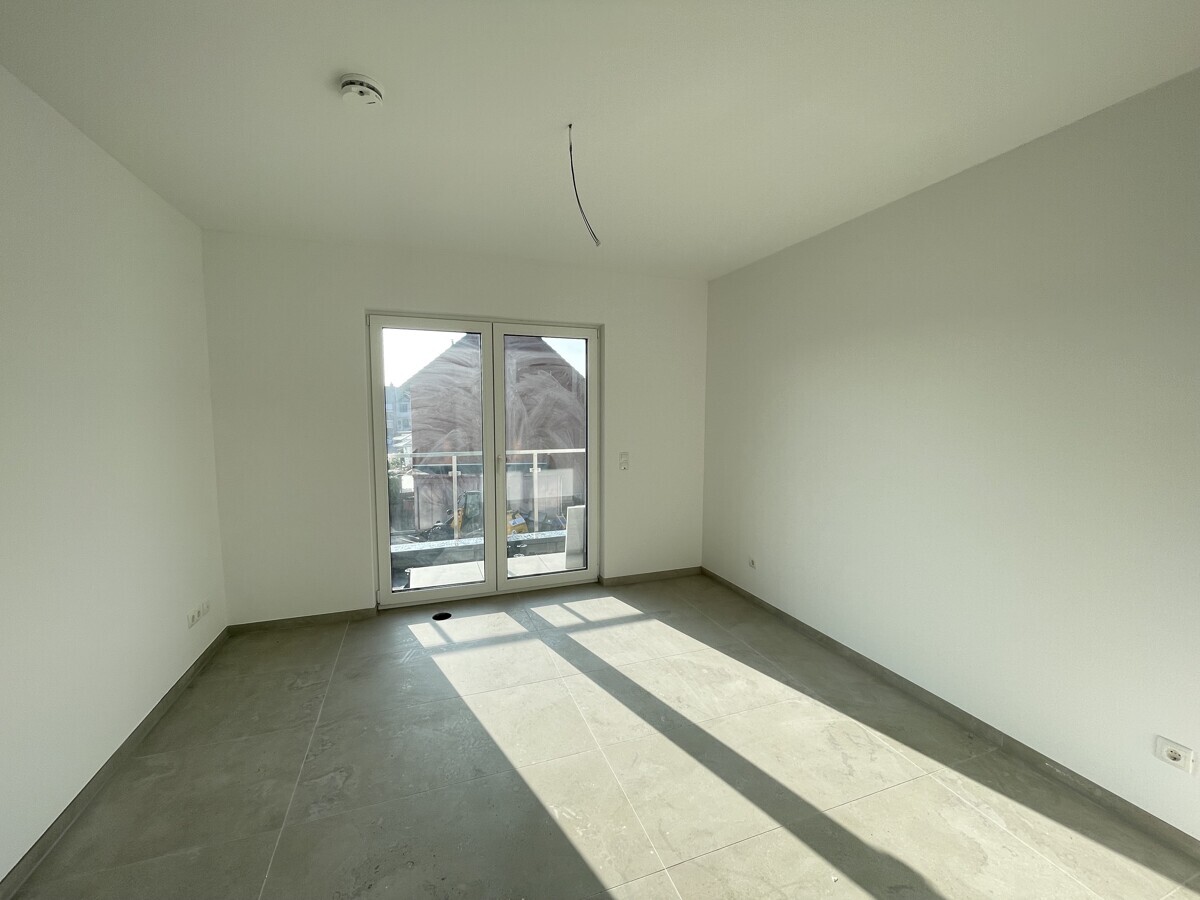 Elternzimmer mit Balkonzugang