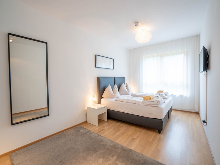 topspeed-immobilien-Schlafzimmer 1-Steiermark-Schladming-84,52_m²_Anlage-Apartment_in_der_SUN_LODGE_–_Wellness,_Sauna,_Swimmingpool_Top_Aussicht,_Sonnenseite