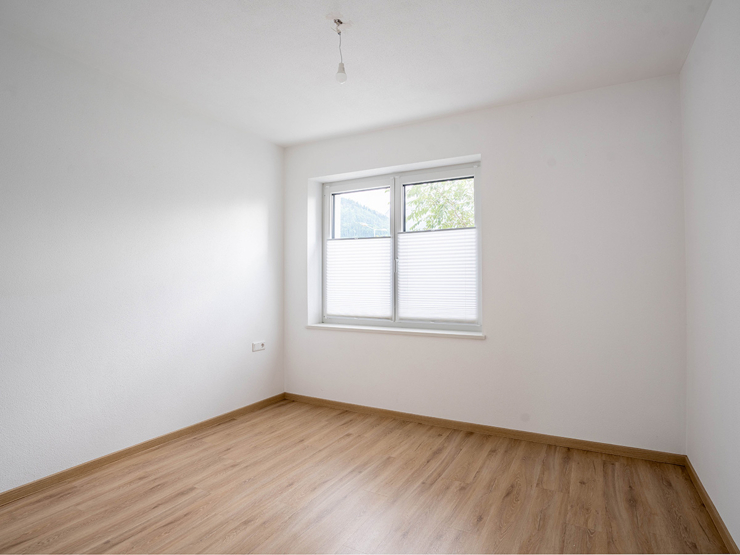 topspeed-immobilien-Schlafzimmer-Steiermark-Michaelerberg-50m²_3-Zimmerwohnung_mit_Südterrasse_in_Moosheim_bei_Gröbming