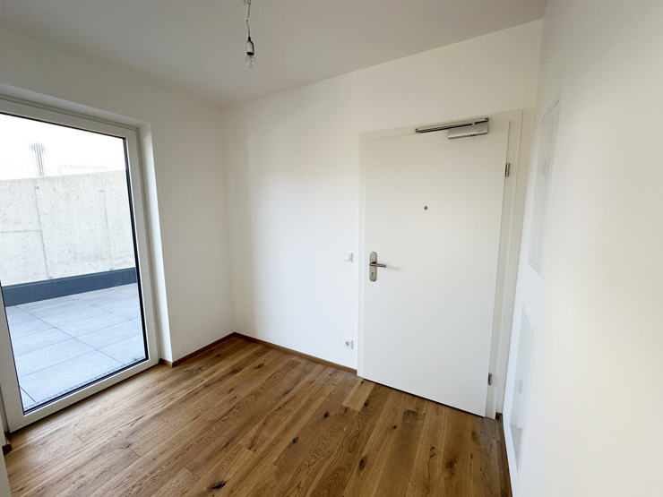 topspeed-immobilien-Zugang - Vorraum B1-Salzburg-Sankt_Johann_im_Pongau-Moderne_2-Zimmer-Gartenwohnung_mit_Terrasse_in_begehrter_Wohnlage_+_2_Tiefgaragenplätze
