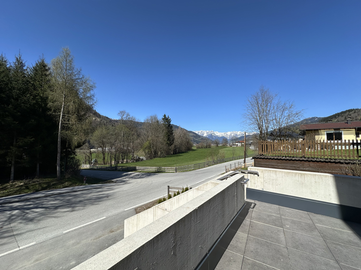 topspeed-immobilien-Aussicht Terrasse B1-Salzburg-Sankt_Johann_im_Pongau-Moderne_2-Zimmer-Gartenwohnung_mit_Terrasse_in_begehrter_Wohnlage_+_2_Tiefgaragenplätze