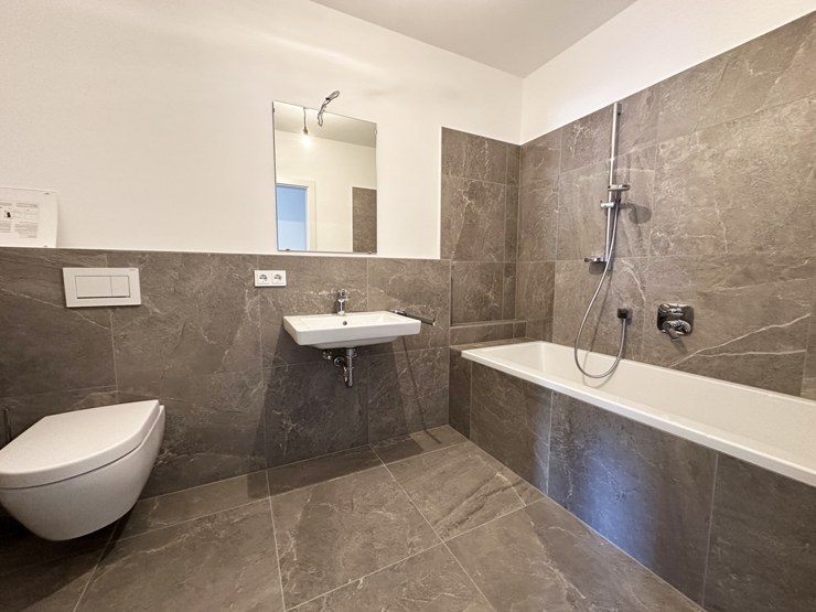 topspeed-immobilien-Bad B3-Salzburg-Sankt_Johann_im_Pongau-Moderne_2-Zimmer-Gartenwohnung_mit_Terrasse_in_begehrter_Wohnlage_+_2_Tiefgaragenplätze