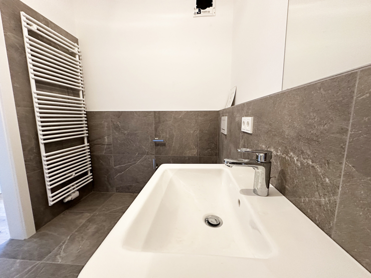 topspeed-immobilien-Bad B1-Salzburg-Sankt_Johann_im_Pongau-Moderne_2-Zimmer-Gartenwohnung_mit_Terrasse_in_begehrter_Wohnlage_+_2_Tiefgaragenplätze