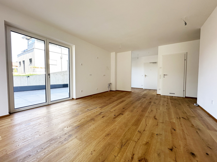 topspeed-immobilien-Wohnbereich B1-Salzburg-Sankt_Johann_im_Pongau-Moderne_2-Zimmer-Gartenwohnung_mit_Terrasse_in_begehrter_Wohnlage_+_2_Tiefgaragenplätze