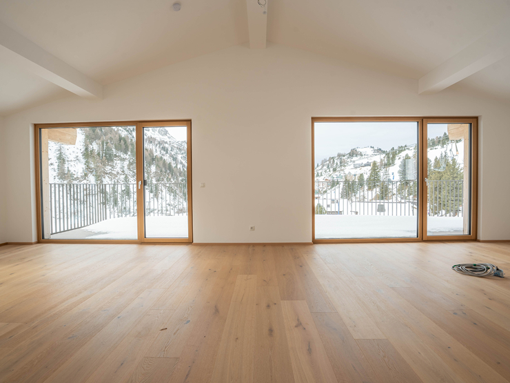 topspeed-immobilien-Wohnzimmer-Salzburg-Obertauern-126_m²_Penthouse_mit_großer_Terrasse_in_Obertauern_–_direkt_an_der_Piste_mit_Bergpanorama_&_Sauna