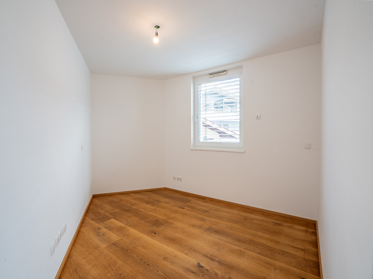 topspeed-immobilien-Zimmer 2-Salzburg-Altenmarkt_im_Pongau-Moderne_Eigentumswohnung_mit_Südbalkon,_2_Schlafzimmern_und_2_PKW-Stellplätzen_in_zentraler_Lage
