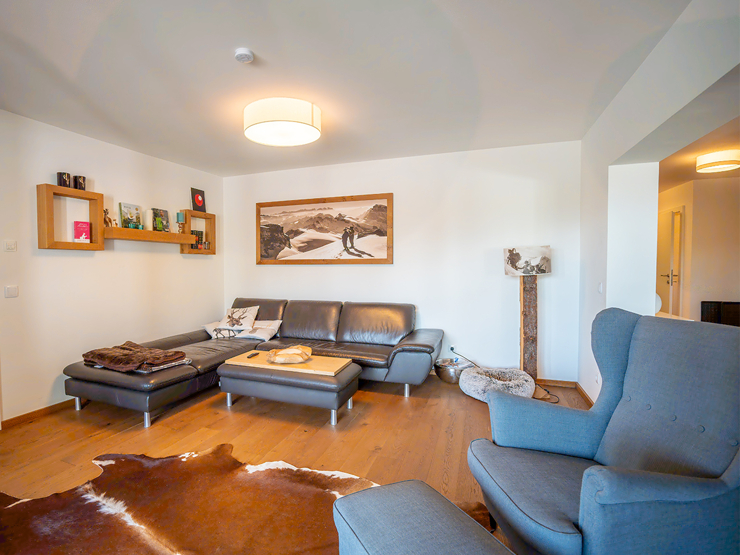 topspeed-immobilien-Wohnzimmer-Salzburg-Altenmarkt_im_Pongau-Naturnah_&_zentral:_Stilvolle_4-Zimmer_Erdgeschosswohnung_mit_großer_Terrasse_im_Ski-Amadé_Skigebiet