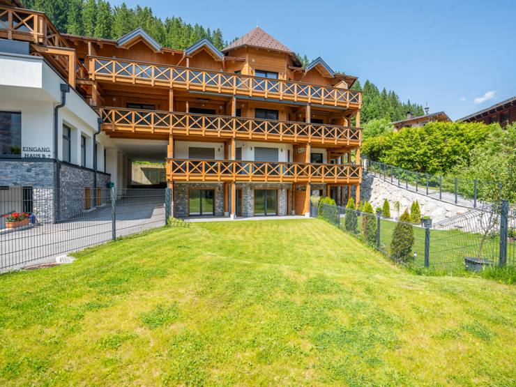 topspeed-immobilien-Gartenansicht-Salzburg-Filzmoos-Erstbezug_in_Pistennähe:_72 m²_Neubauwohnung_mit_großzügigem_Garten