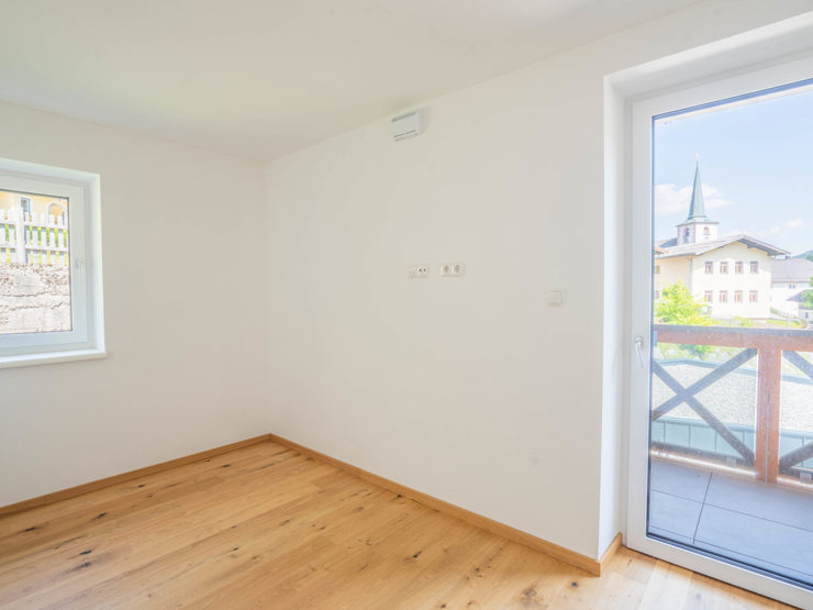 topspeed-immobilien-Schlafzimmer-Salzburg-Filzmoos-Skiliftnähe_&_Weitblick:_87 m²_Dachgeschosswohnung_mit_3_Schlafzimmern_und_großzügigem_Balkon
