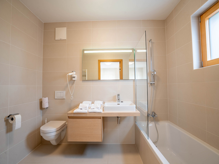 topspeed-immobilien-Bad 2-Steiermark-Schladming-Investment_mit_Aussicht:_Apartment_in_der_SUN_LODGE_–_81m²_Apartment,_Wellness_&_Pool