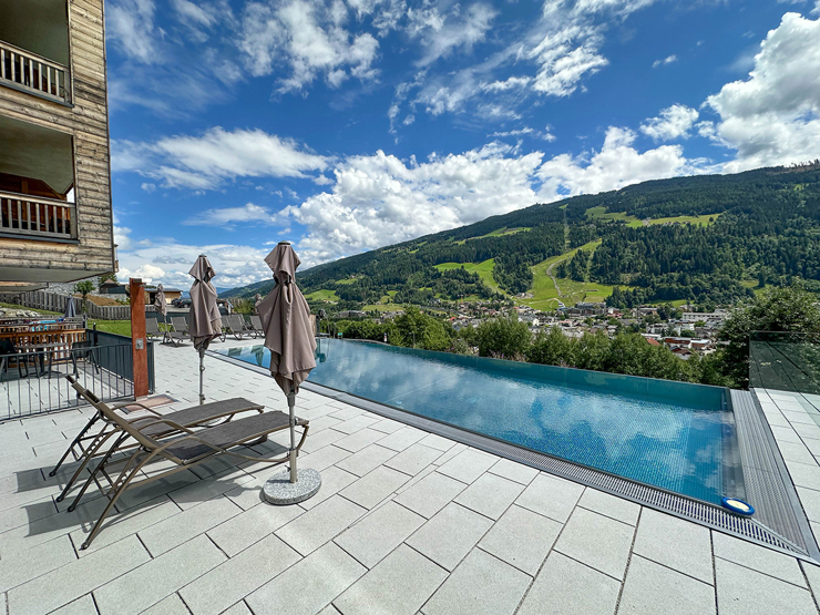 topspeed-immobilien-Infintypool-Steiermark-Schladming-MyLodge_-Top-Investment:_Stilvolles_3-Zimmer-Apartment_mit_Privater_Sauna_&_Blick_auf_die_Planai