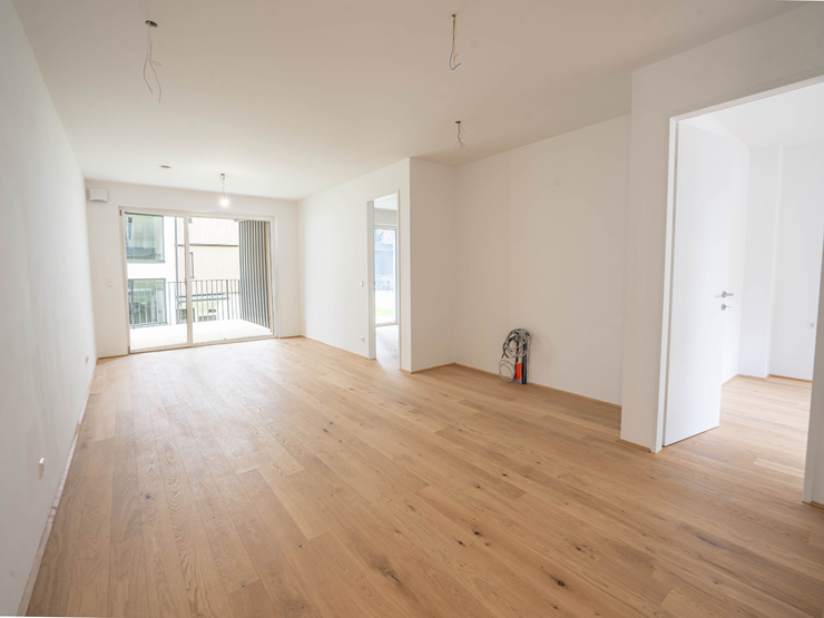 topspeed-immobilien-Wohnzimmer-Steiermark-Schladming-Mietwohnung_im_„Tauern_Quartett“_in_Schladming_–_Erstbezug_mit_zwei_Schlafzimmern