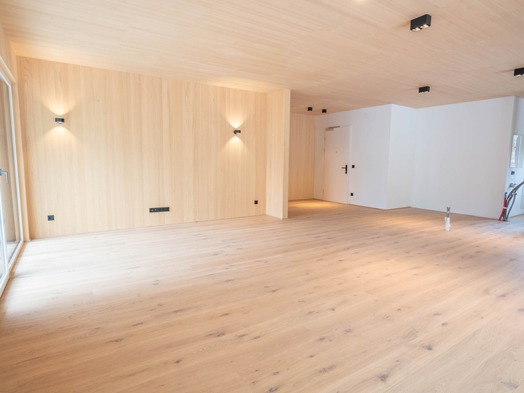 topspeed-immobilien-Wohnzimmer-Steiermark-Schladming-Luxus-Penthouse_in_Schladming:_136_m²_Wohnfläche_&_105_m²_Süd_Terrasse_nahe_der_Planai_West