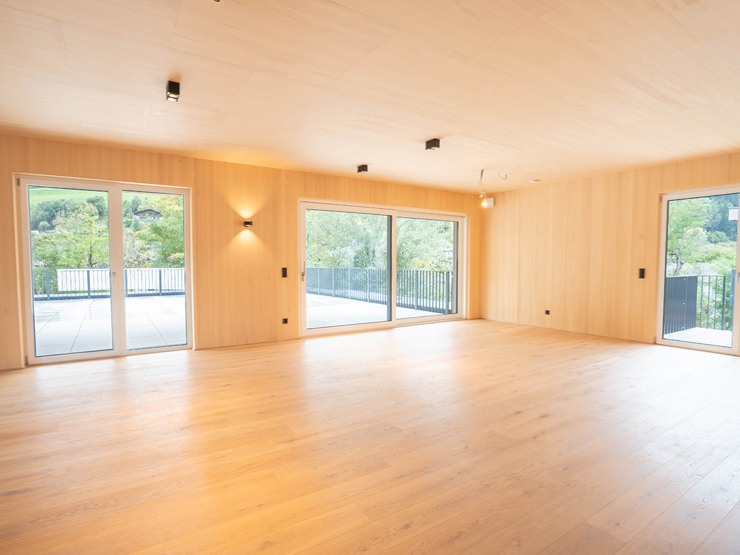 topspeed-immobilien-Wohnzimmer-Steiermark-Schladming-Luxus-Penthouse_in_Schladming:_136_m²_Wohnfläche_&_105_m²_Süd_Terrasse_nahe_der_Planai_West