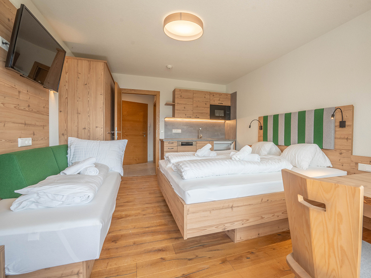 topspeed-immobilien-Ausstattung "Alpine"-Steiermark-Gröbming-33_m²_Investment-Hit_mit_großzügiger_14,8_m²_Sonnenterrasse_|_Zwei_Zimmer_Anlage-Apartment