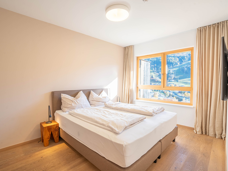 topspeed-immobilien-Schlafzimmer-Steiermark-Schladming-ZWEITWOHNSITZ_oder_Vermietung_möglich!_53,58_m²_–_2-Zimmer-Apartment_in_der_SunLodge