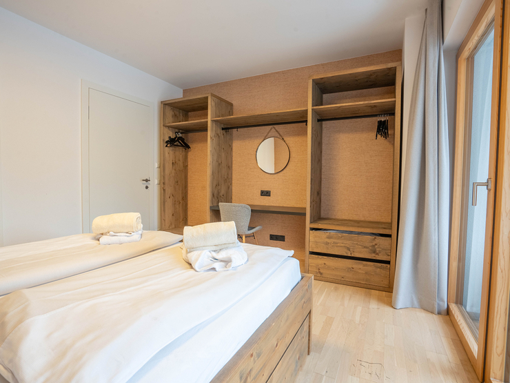 topspeed-immobilien-Schlafzimmer 1-Steiermark-Schladming-Ankommen,_abschalten,_bleiben_–_Zweitwohnsitz-Apartment_mit_Blick_auf_die_Planai