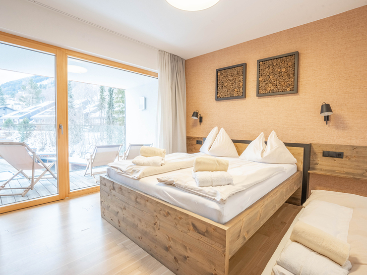 topspeed-immobilien-Schlafzimmer 1-Steiermark-Schladming-Ankommen,_abschalten,_bleiben_–_Zweitwohnsitz-Apartment_mit_Blick_auf_die_Planai