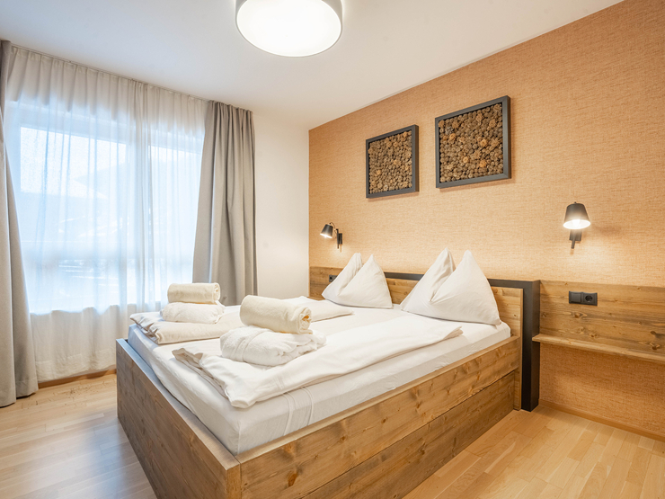 topspeed-immobilien-Schlafzimmer 3-Steiermark-Schladming-Ankommen,_abschalten,_bleiben_–_Zweitwohnsitz-Apartment_mit_Blick_auf_die_Planai