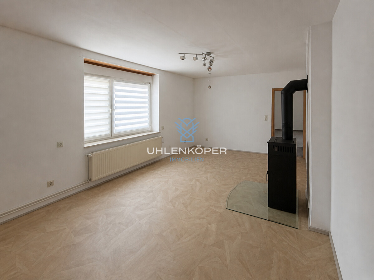 Wohnzimmer mit Kamin
