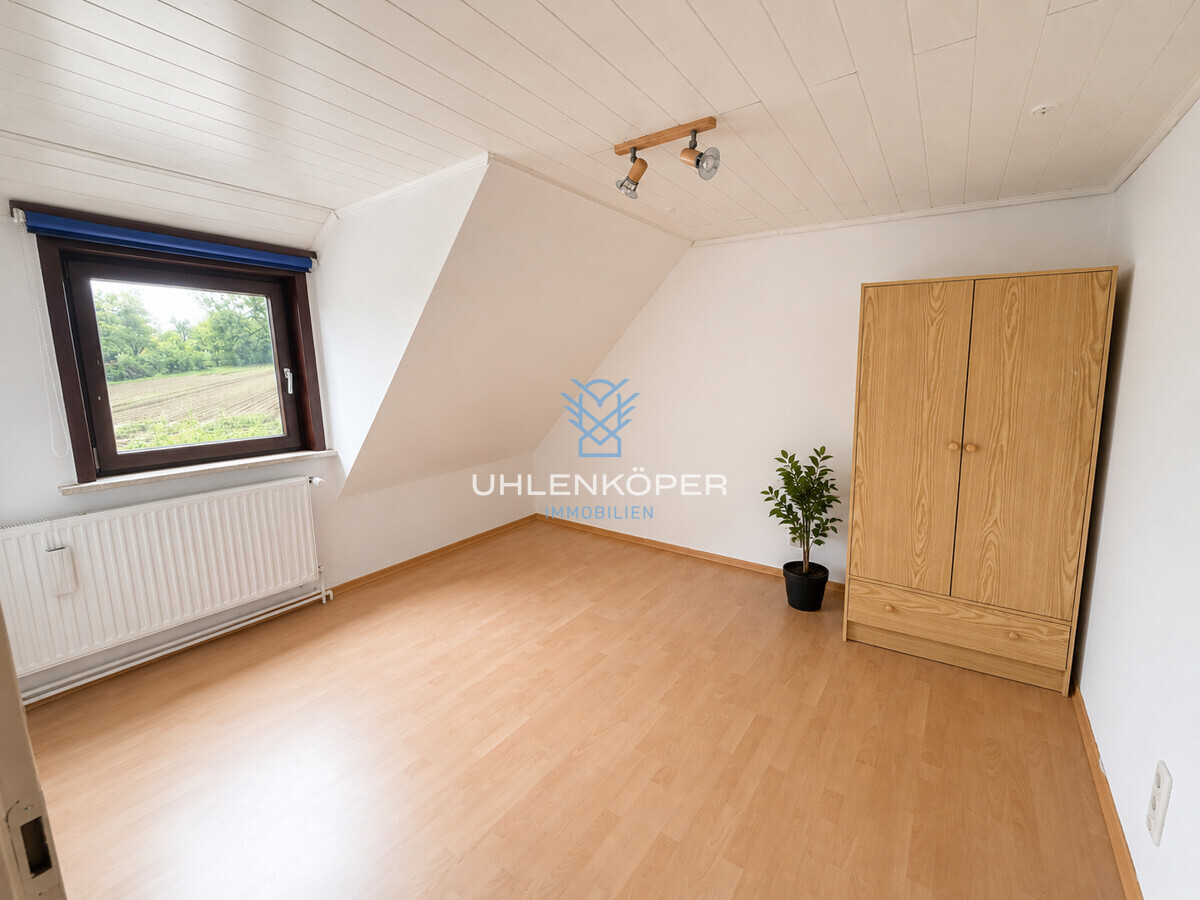Schlafzimmer rechts im Dachgeschoss 