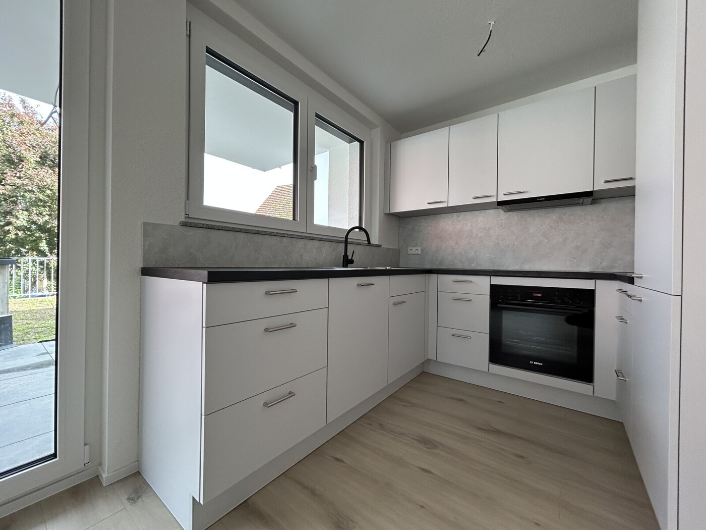 4-Zimmerwohnung mit Einbauküche und Garten zu vermieten! Erstbezug