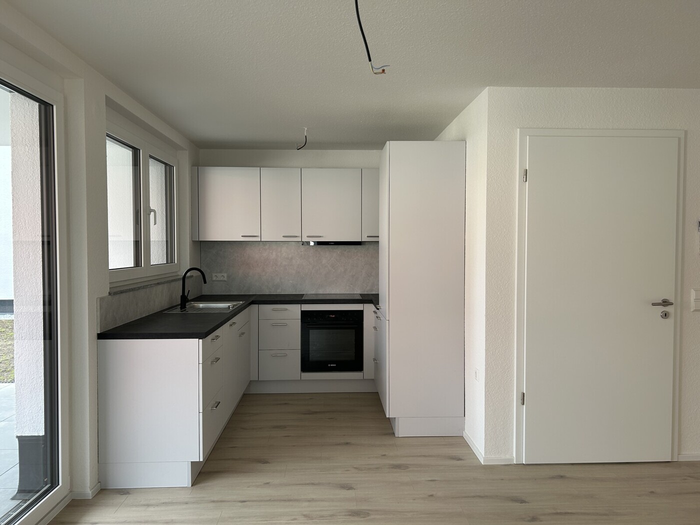 4-Zimmerwohnung mit Einbauküche und Garten zu vermieten! Erstbezug