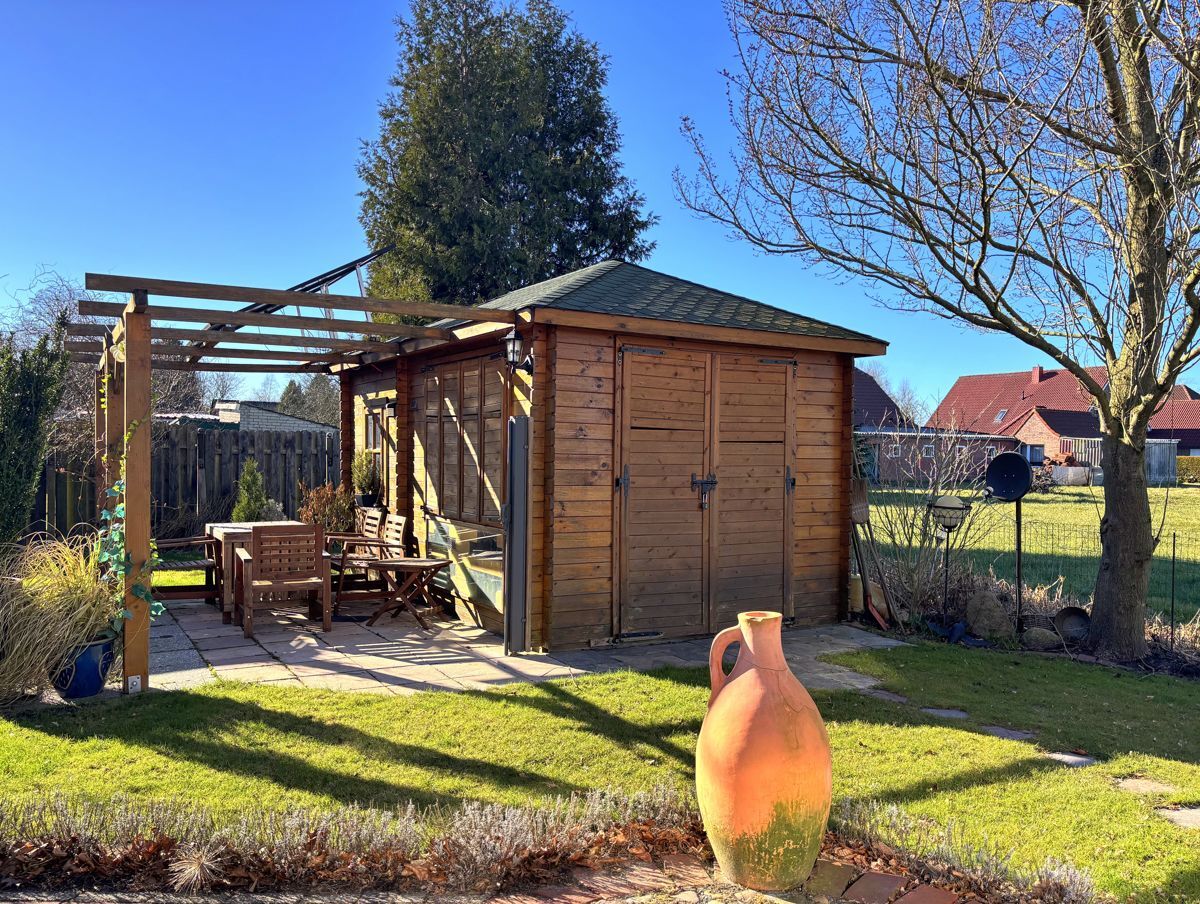 Holzblockhaus mit Terrasse
