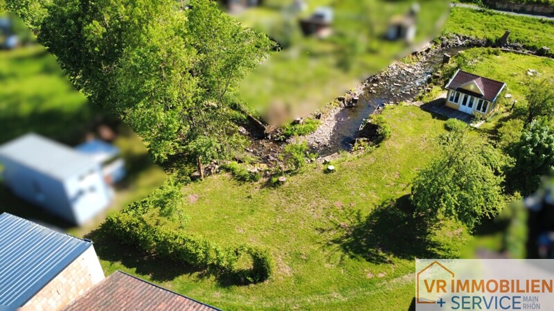 Luftaufnahme Gartengrundstück mit Hütte