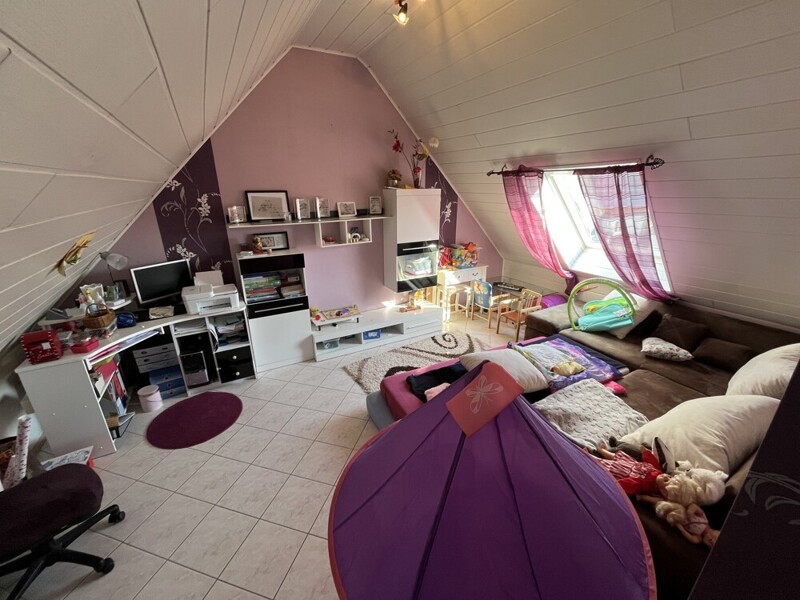 Kinderzimmer über der Garage